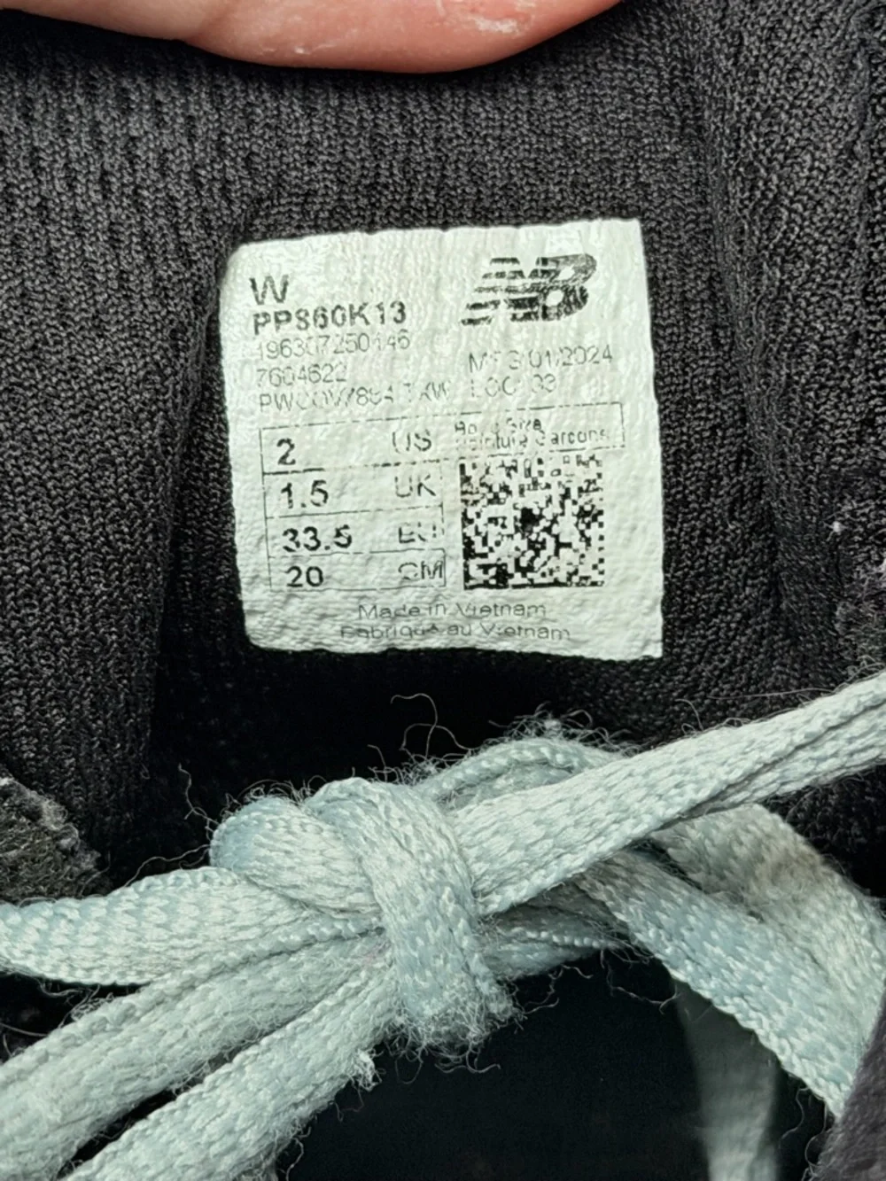 New Balance Black Sneakers with Light Blue Laces